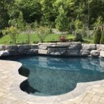 Black slate liner installed to an irregularly shaped pool