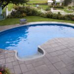 Blue Raleigh pool liner installed to an oval pool