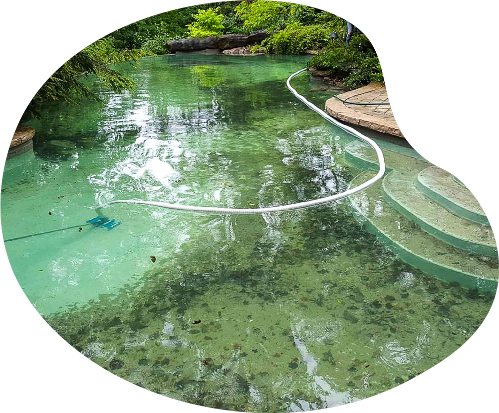 Summertime Pool Services, cleaning the bottom of a pool.